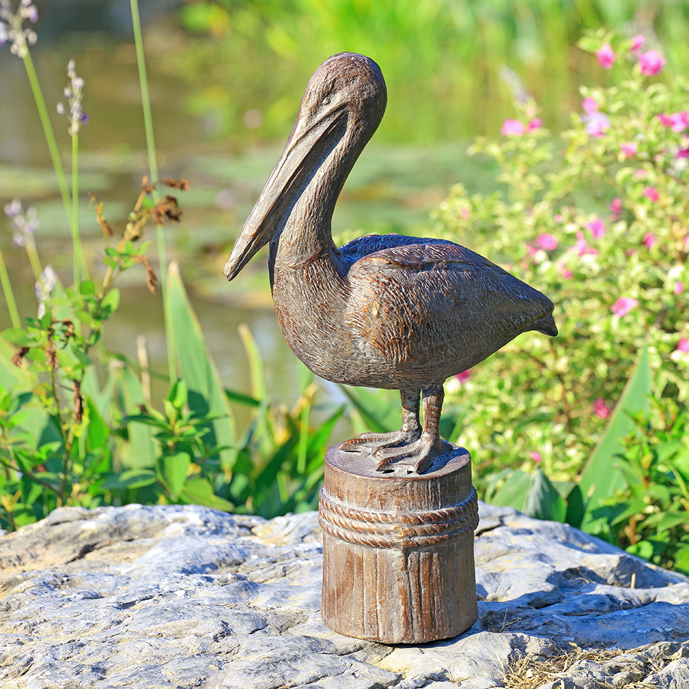 Feathered Fisherman Pelican Garden Sculpture