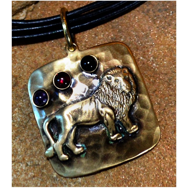 Antiqued Hammered Brass Lion Pendant on Rawhide by Elaine Coyne